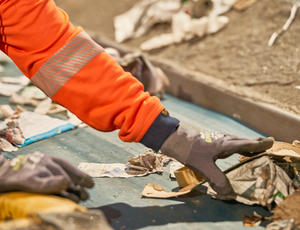 Sorting rubbish on a conveyer belt 
