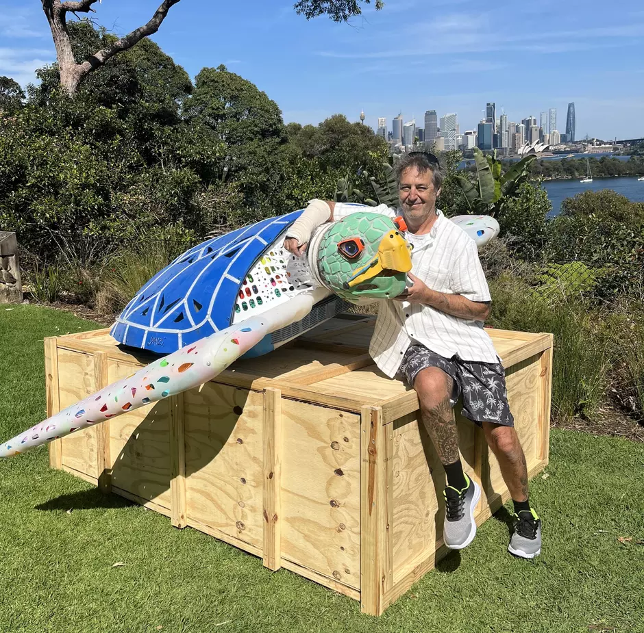 Artist David Day and turtle sculpture